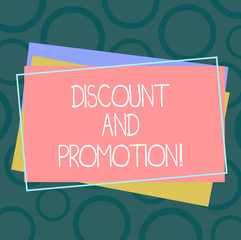 Handwriting text Discount And Promotion. Concept meaning reductions to a basic price of goods or services Pile of Blank Rectangular Outlined Different Color Construction Paper