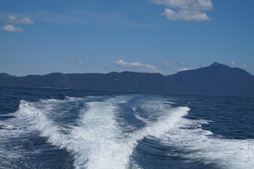 White Water Wake Behind a Speeding Boat