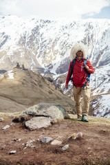 Obraz premium Hiker with traditional papakha fur hat at Mtskheta-Mtianeti region in Georgia