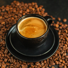 coffee freshly brewed in a white cup serving of beverage (coffee grain). food. top. copy space