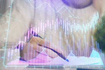 Forex chart displayed on woman's hand taking notes background. Concept of research. Multi exposure