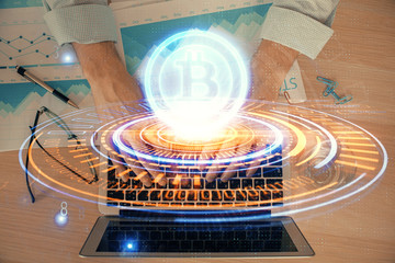 Blockchain theme hud with man working on computer on background. Concept of crypto chain. Double...