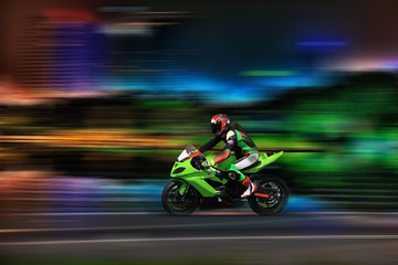 Obraz na płótnie Canvas Racing bike rider racing at high speed
