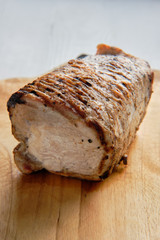 Baked peace of meat on cutting board