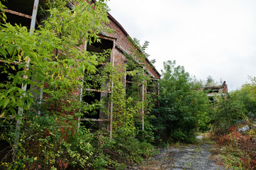 Industrial exterior of an old abandoned factory.