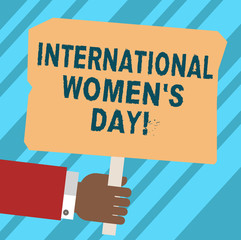 Word writing text International Women S Day. Business concept for International celebration for womens achievement Hu analysis Hand Holding Blank Colored Placard with Stick photo Text Space