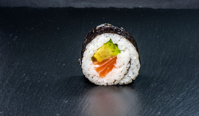 sushi roll on slate