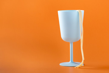 Boiled spaghetti on the edge of the glass