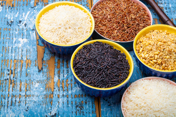 Different types of rice, white basmati, jasmine, arborio, brown and black