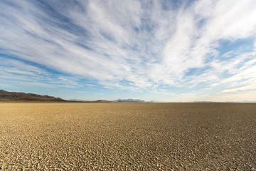 Black Rock playa desert at sunrise with a beautiful cloudy sky