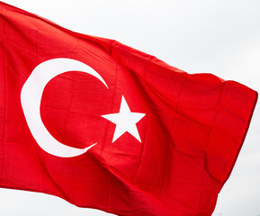 Flag of Turkey waving in the wind with highly detailed fabric texture