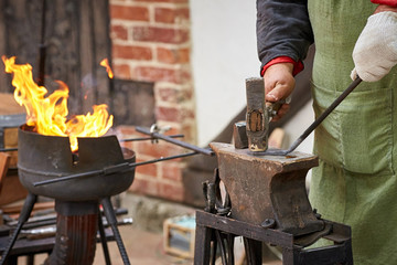 Closeup of a working blacksmith