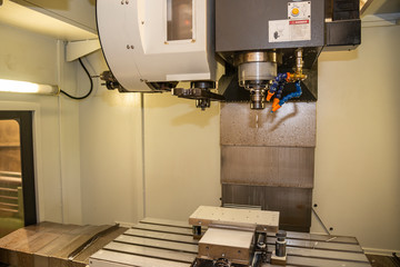 The chamber room of vertical CNC milling machine .The vertical machining center with the reamer tool. © Pixel_B