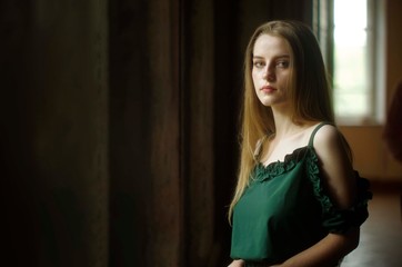 Fototapeta premium beautiful young blonde with long flowing hair and big breasts