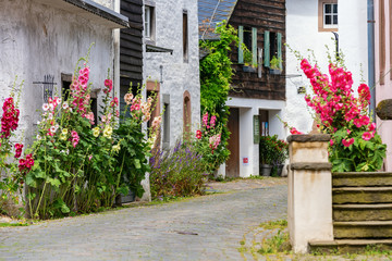Fototapeta na wymiar picturesque alley in the historic village Kronenburg in the Eifel region, Germany
