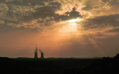 sunset with power station