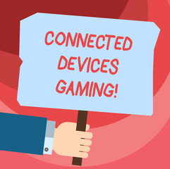 Word writing text Connected Devices Gaming. Business concept for devices operate interactively and autonomously Hu analysis Hand Holding Blank Colored Placard with Stick photo Text Space