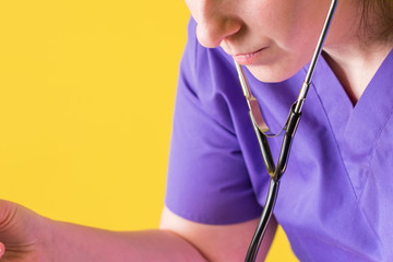 Woman doctor with stethoscope