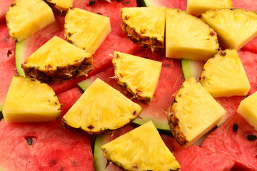 Pineapple and watermelon slices background.