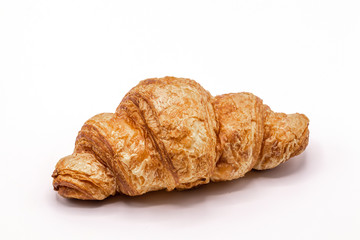Fresh and tasty buttery croissants isolate on white background.