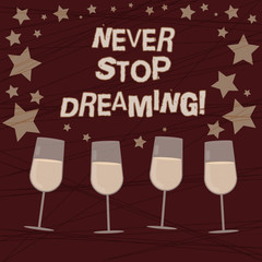 Conceptual hand writing showing Never Stop Dreaming. Business photo showcasing dont waste your time in fantasy stick to achieve them Filled Cocktail Wine with Scattered Stars Confetti Stemware