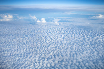 Blue sky with white cloud under sunlight. Use for nature background or wallpaper.