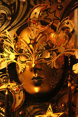 Golden Venetian ball mask. Masquerade party or holiday event celebration decoration.