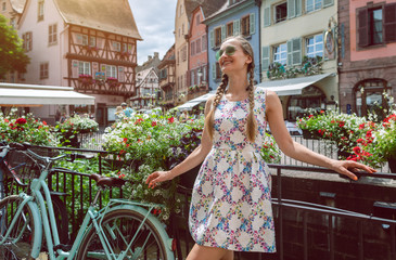 Woman tourist visiting the town of Colmar, Alsace, France