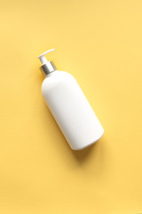 White Dispenser on Yellow
