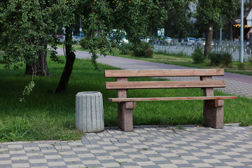 Bench in a public parkland.Summer vacation