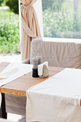 Table and chairs in park cafe. Modern design interior. Concept of vacation and leisure