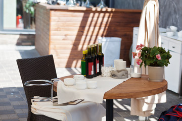 Table and chairs in park cafe. Modern design interior. Concept of vacation and leisure