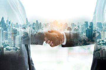 Double exposure of Teamwork,partnership and Social connection in business,Finishing up a...