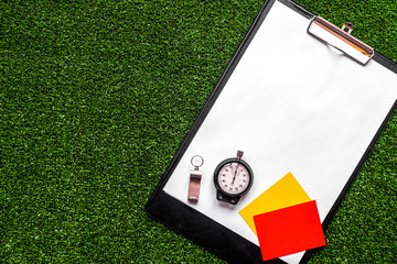 concept refereeing sport on green background top view mock up