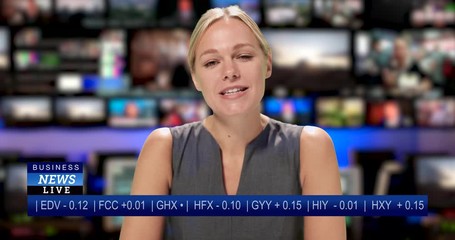 MS Female anchor speaking at news desk