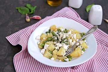 Potato Salad with Green Asparagus Beans and Feta Cheese. Harvest potatoes. Thanksgiving concept. American cuisine.