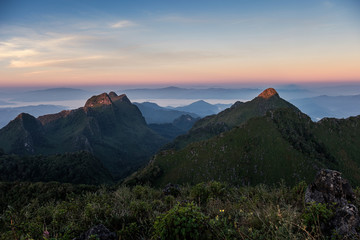 Landscape of mountain range in wildlife sanctuary at sunrise