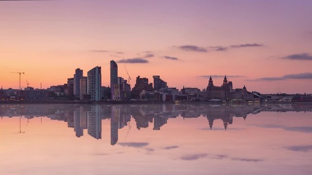 liverpool city skyline timelapse night to day from mersey river england uk