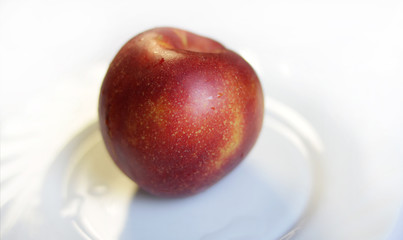 Ripe peach/.nectarine fruits isolated on white background