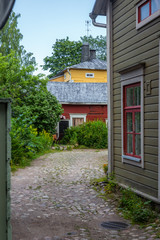 Cobbled streets and colorfully painted old wooden houses in Porvoo in Finland in a summer evening - 7