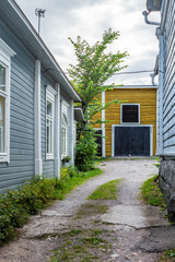 Cobbled streets and colorfully painted old wooden houses in Porvoo in Finland in a summer evening - 9