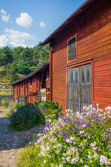 The colorful red wooden warehouses of Porvoo in Finland  during a warm summer day - 2