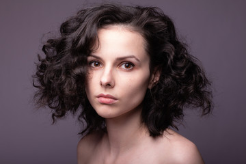 Naklejka premium beautiful young curly girl portrait