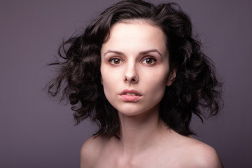 Naklejka premium beautiful young curly girl portrait