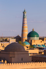 Naklejka premium Mosques and minarets in Khiva Uzbekistan at sunset