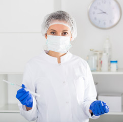 Fototapeta premium Nurse making injection