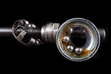 Replacing the bicycle wheel bearing. Bicycle parts service in the workshop.