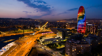 Night view of Barcelona cityscape with Torre Glories