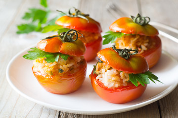 Tomatoes stuffed with rice, cheese and parsley