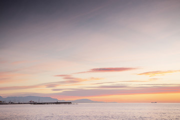 sun coming up over the sea